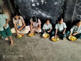 Children taking breakfast(bhagwans Prasadam)